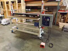 Sheet-to-sheet laminator